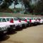 Staff and luxury 4x4 rental cars in Africa